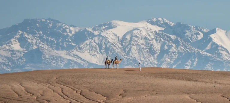 Snow-capped Atlas Mountains behind the Agafay desert near Marrakech in winter