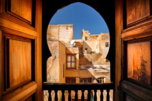 Carved cedar window over a riad terrace – 5 Day Tour from Marrakech to Fes