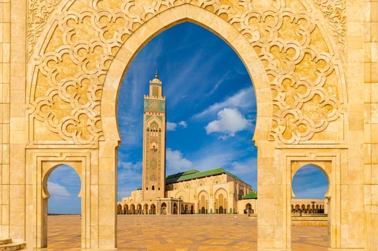 Hassan II Mosque: "Close-up of the intricate zellij tilework and detailed craftsmanship on the exterior of the Hassan II Mosque in Casablanca."